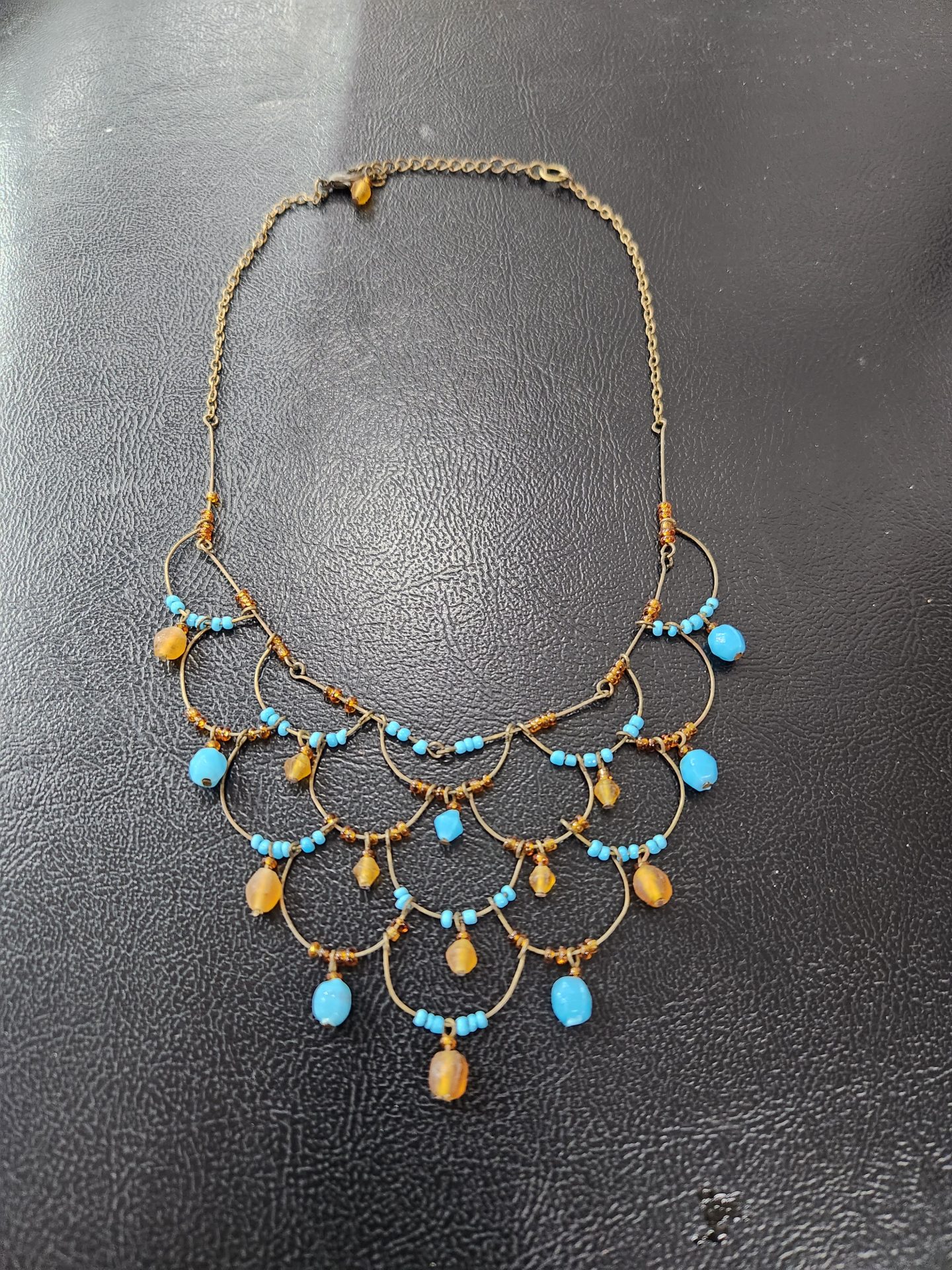 Blue and Brown Necklace Picker Place
