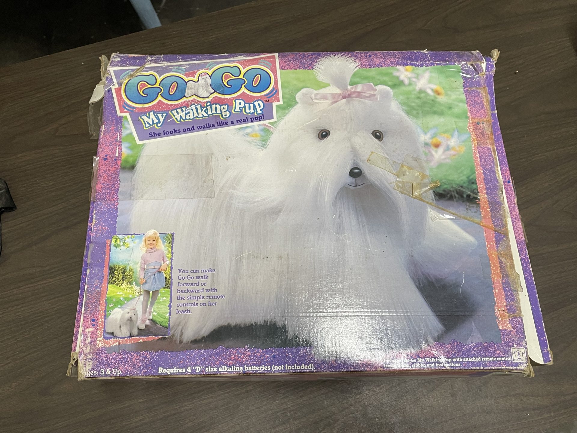 1990 Go Go Walking Pup Picker Place